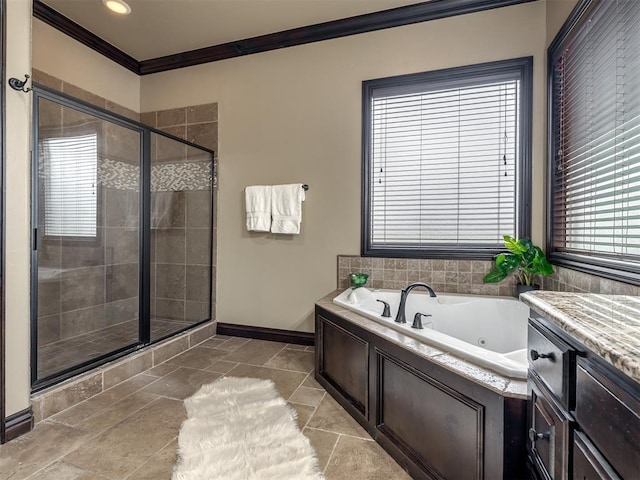 bathroom with vanity, ornamental molding, and shower with separate bathtub