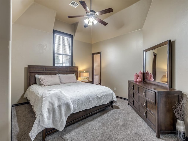 bedroom with ceiling fan and light colored carpet