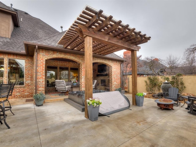 view of patio featuring a pergola and an outdoor living space with a fireplace