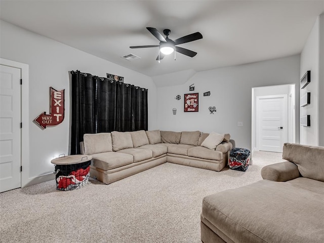 carpeted living room featuring lofted ceiling and ceiling fan