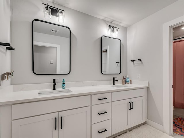 bathroom featuring vanity