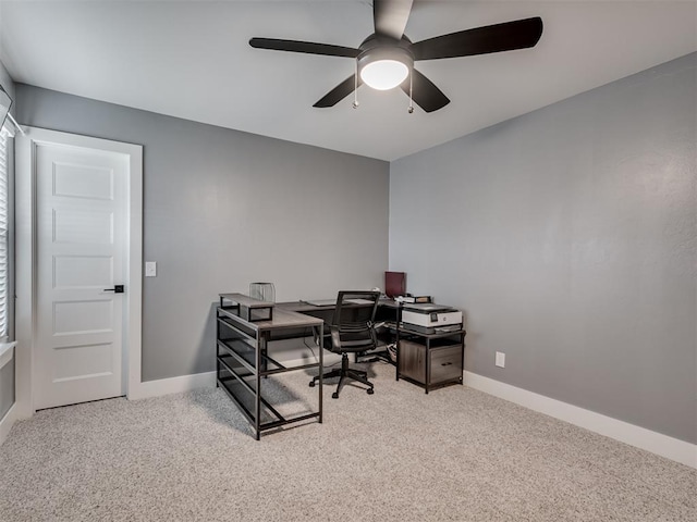 office with ceiling fan and light carpet