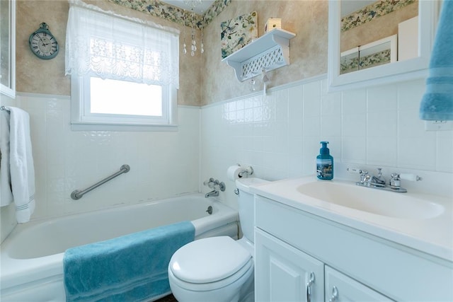 bathroom with vanity, toilet, and tile walls