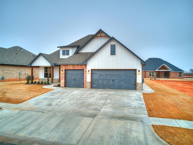 view of front of property with a garage and a front yard