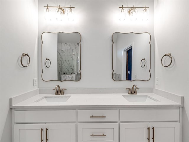 bathroom with vanity and a shower