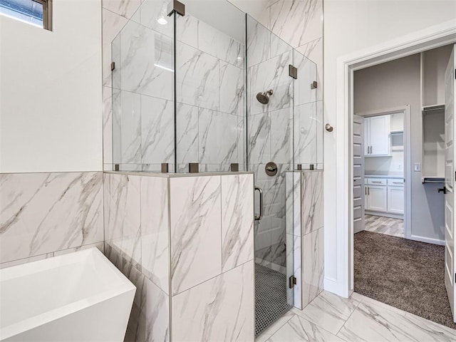 bathroom with sink and independent shower and bath