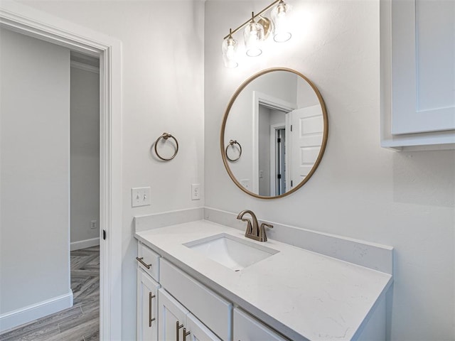 bathroom featuring vanity and wood-type flooring