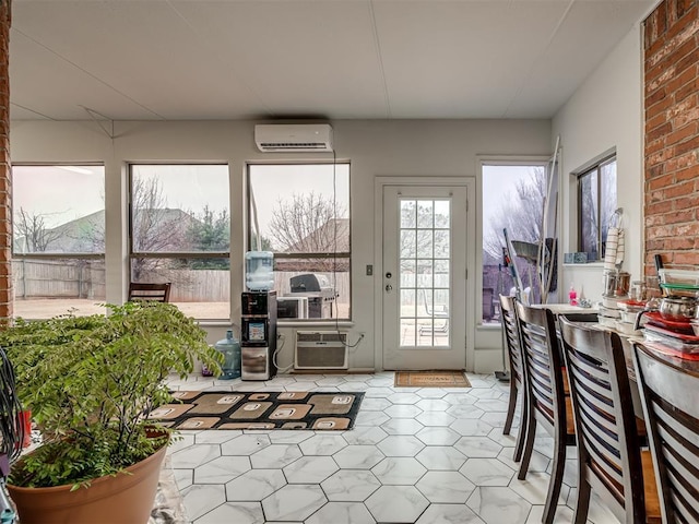 sunroom with an AC wall unit