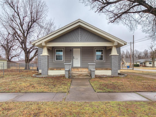 bungalow-style home with covered porch