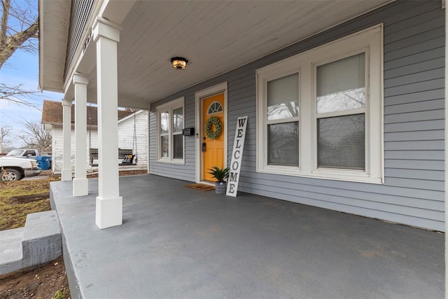 property entrance with a porch