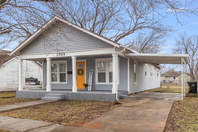 bungalow-style home featuring covered porch