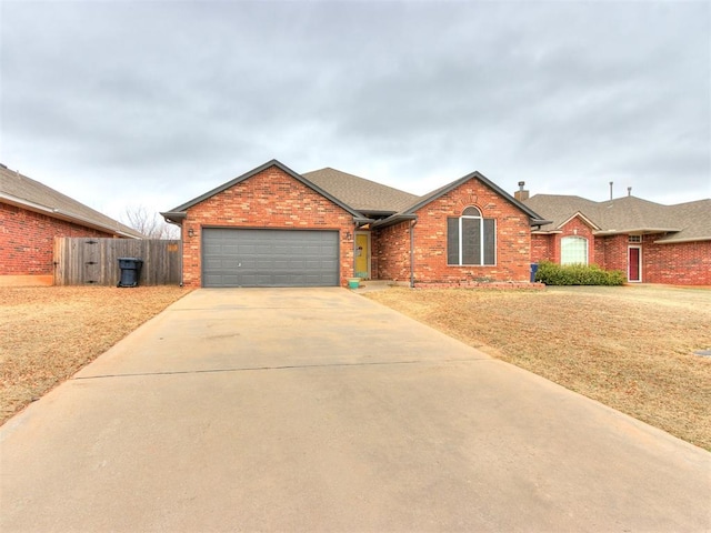 single story home featuring a garage