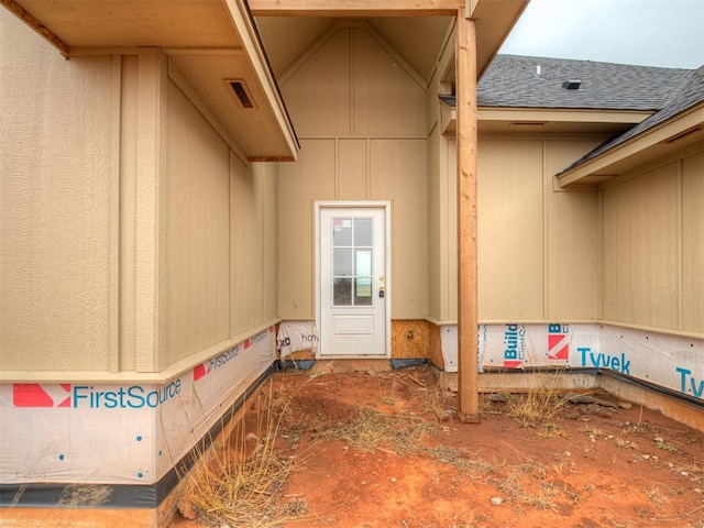 view of exterior entry with visible vents