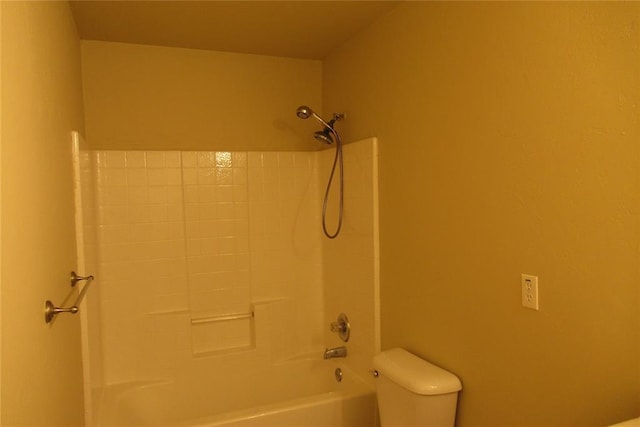 bathroom featuring toilet and shower / washtub combination