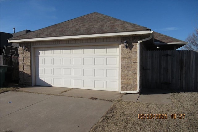 garage with fence