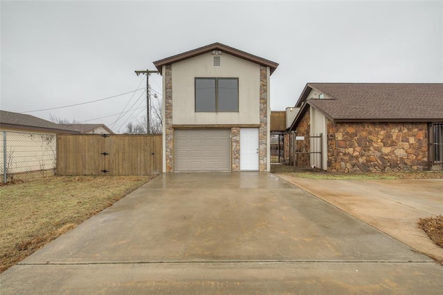 view of front of home featuring a garage