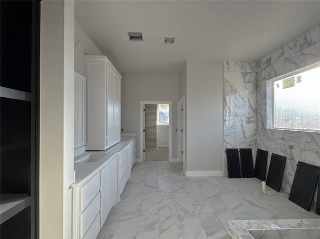 bathroom with plenty of natural light