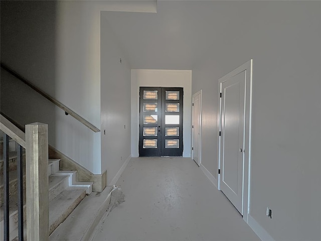 foyer entrance featuring french doors