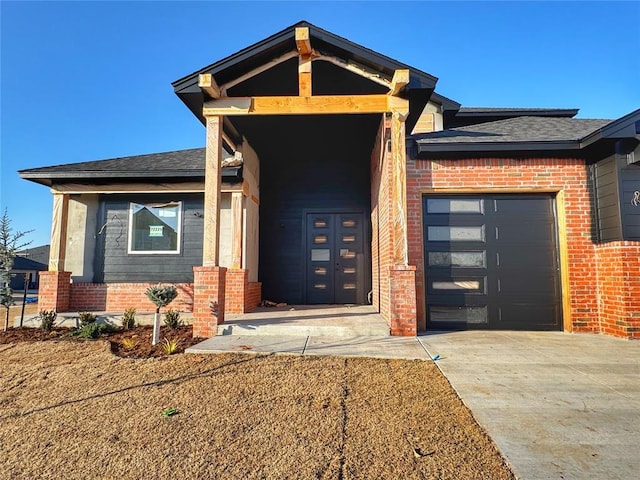 view of front of home with a garage