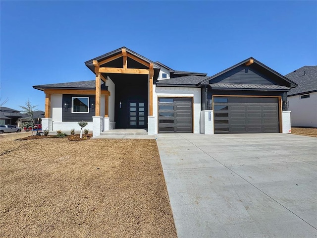 7225 NW 154th St, Edmond, OK 73013 - view of front of home featuring driveway and a garage
