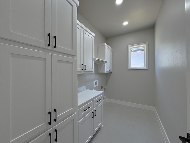 7225 NW 154th St, Edmond, OK 73013 - laundry room featuring washer hookup, hookup for an electric dryer, cabinet space, baseboards, and recessed lighting