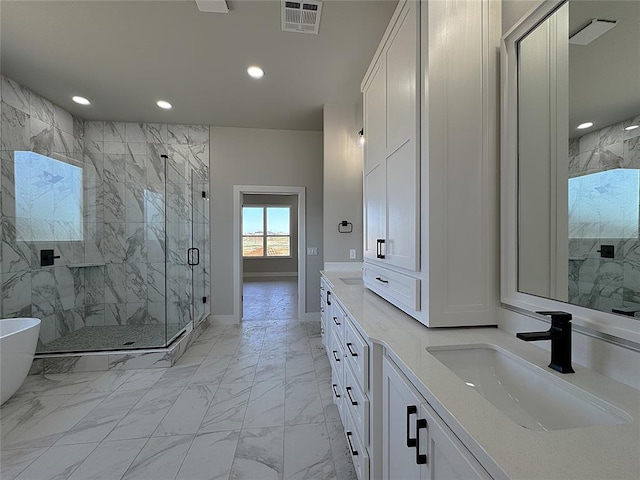 7225 NW 154th St, Edmond, OK 73013 - full bath featuring marble finish floor, a sink, visible vents, and recessed lighting
