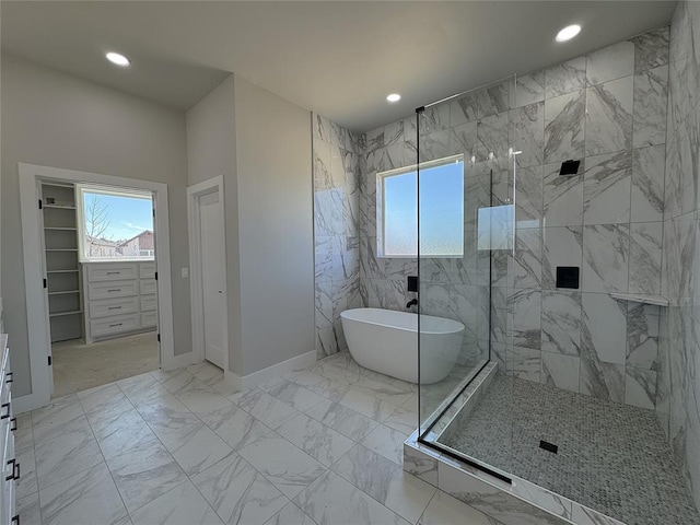 7225 NW 154th St, Edmond, OK 73013 - bathroom featuring marble finish floor, a wealth of natural light, and a shower stall