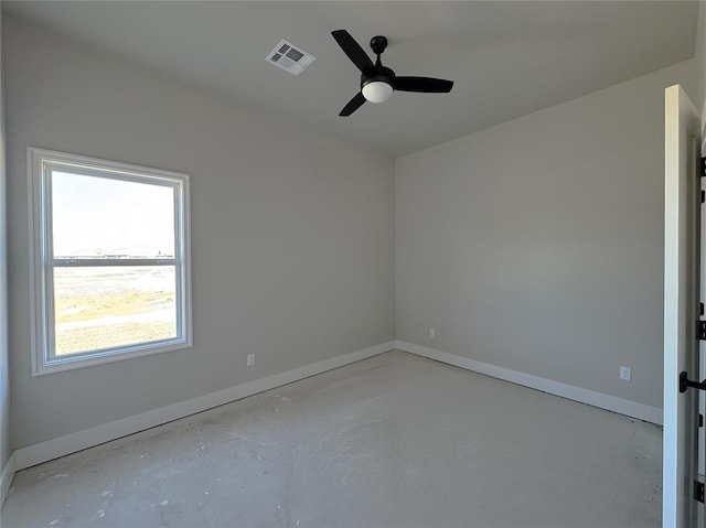 7225 NW 154th St, Edmond, OK 73013 - unfurnished room featuring baseboards, concrete flooring, visible vents, and plenty of natural light