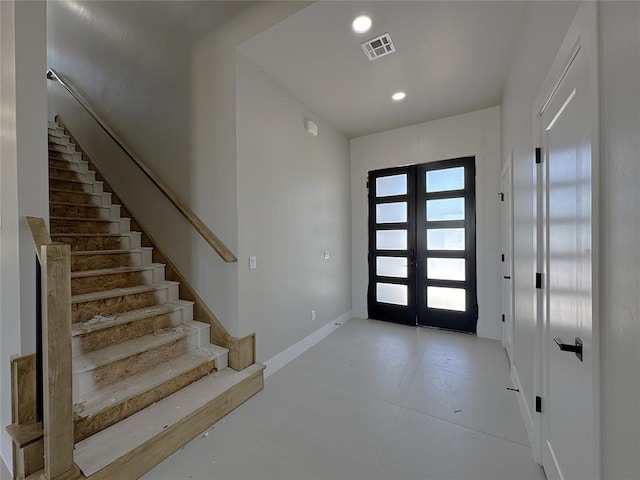 7225 NW 154th St, Edmond, OK 73013 - entrance foyer with recessed lighting, visible vents, french doors, baseboards, and stairs