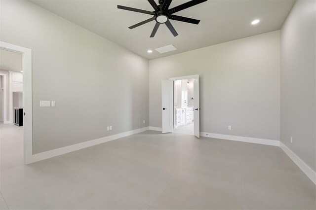 7225 NW 154th St, Edmond, OK 73013 - spare room featuring ceiling fan, finished concrete flooring, and recessed lighting