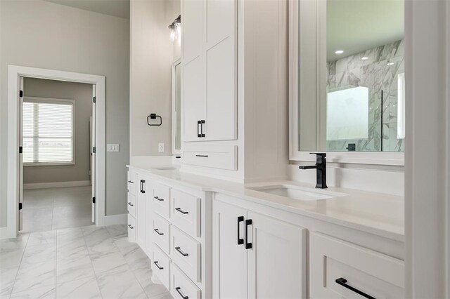 7225 NW 154th St, Edmond, OK 73013 - bathroom featuring double vanity, a marble finish shower, and marble look tile flooring
