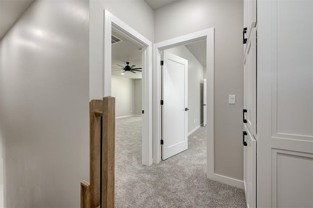 7225 NW 154th St, Edmond, OK 73013 - corridor with light colored carpet and baseboards