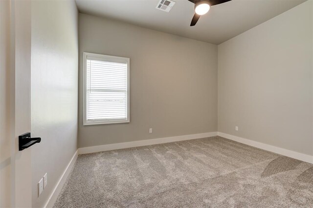 7225 NW 154th St, Edmond, OK 73013 - carpeted spare room with ceiling fan and baseboards