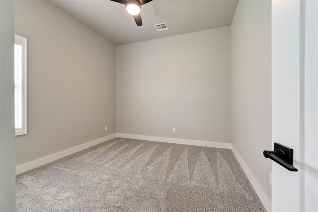 7225 NW 154th St, Edmond, OK 73013 - carpeted empty room with a ceiling fan and plenty of natural light
