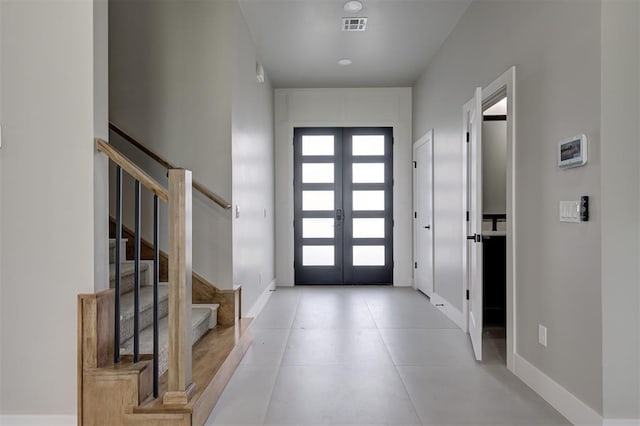 7225 NW 154th St, Edmond, OK 73013 - entryway with french doors and stairway