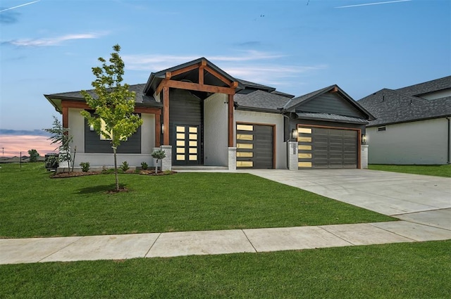 7225 NW 154th St, Edmond, OK 73013 - modern home with a garage, concrete driveway, and a yard