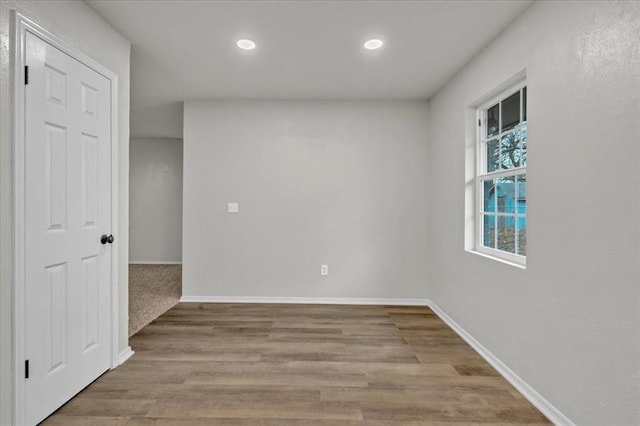 empty room with light wood-type flooring