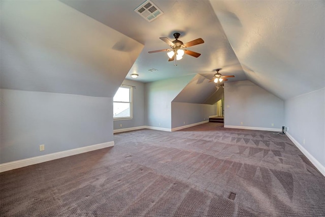 bonus room with vaulted ceiling, carpet floors, and ceiling fan