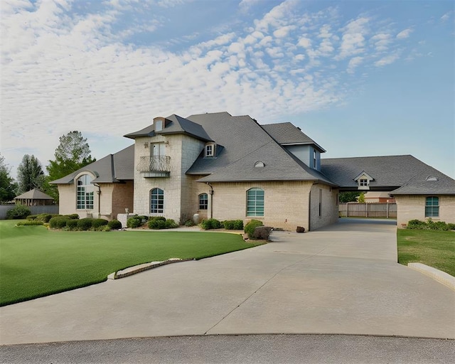 320 S Lysbeth Ct, Goldsby, OK 73093 - french provincial home with brick siding and roof with shingles