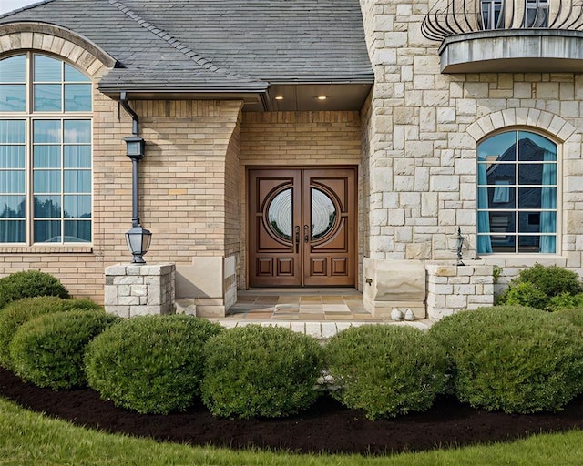 320 S Lysbeth Ct, Goldsby, OK 73093 - view of exterior entry with brick siding and stone siding