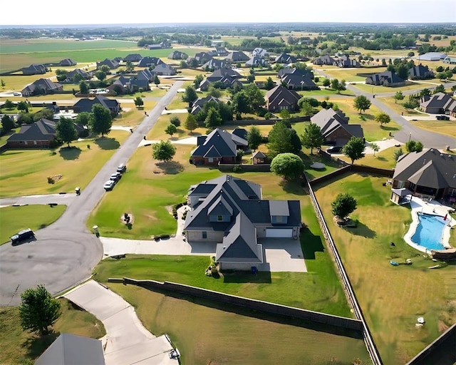 320 S Lysbeth Ct, Goldsby, OK 73093 - aerial view of property and surrounding area featuring nearby suburban area and a pool area