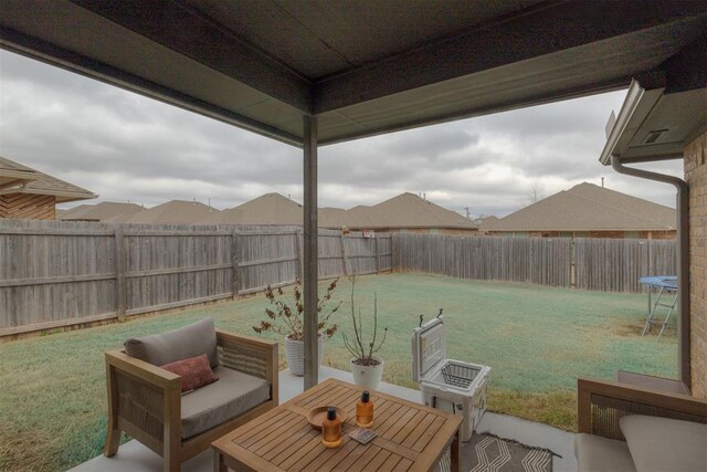 8609 SW 36th Ter, Oklahoma City, OK 73179 - fenced backyard featuring a patio and outdoor lounge area