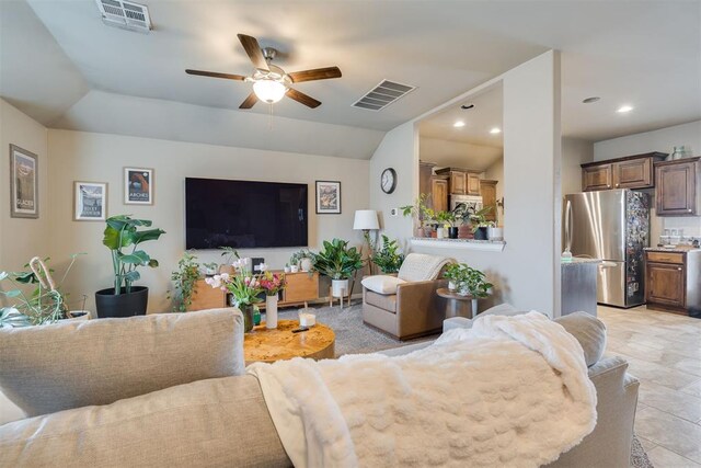 8609 SW 36th Ter, Oklahoma City, OK 73179 - living area with ceiling fan, recessed lighting, and vaulted ceiling