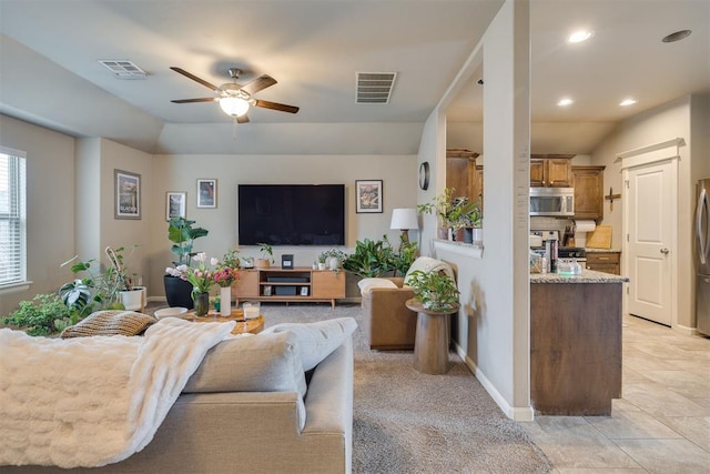 8609 SW 36th Ter, Oklahoma City, OK 73179 - living area featuring ceiling fan, recessed lighting, and light tile patterned flooring