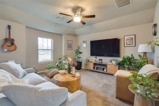 8609 SW 36th Ter, Oklahoma City, OK 73179 - carpeted living room with ceiling fan and baseboards