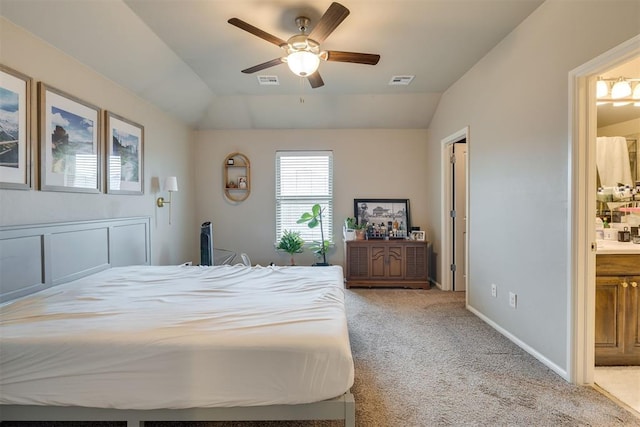 8609 SW 36th Ter, Oklahoma City, OK 73179 - carpeted bedroom with lofted ceiling, ensuite bathroom, and ceiling fan