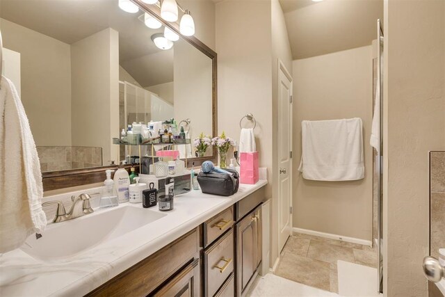 8609 SW 36th Ter, Oklahoma City, OK 73179 - bathroom with double vanity and a shower