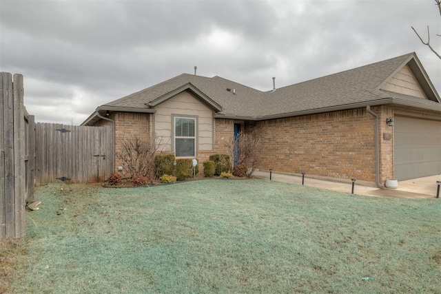 8609 SW 36th Ter, Oklahoma City, OK 73179 - single story home with brick siding, roof with shingles, and an attached garage
