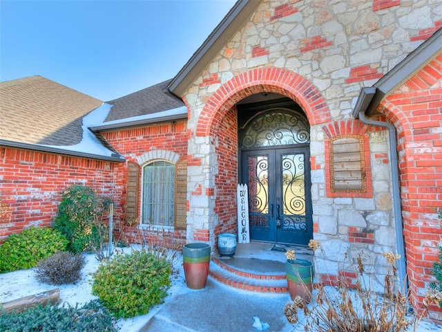 entrance to property featuring french doors