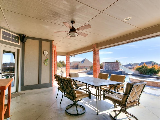 view of patio with ceiling fan